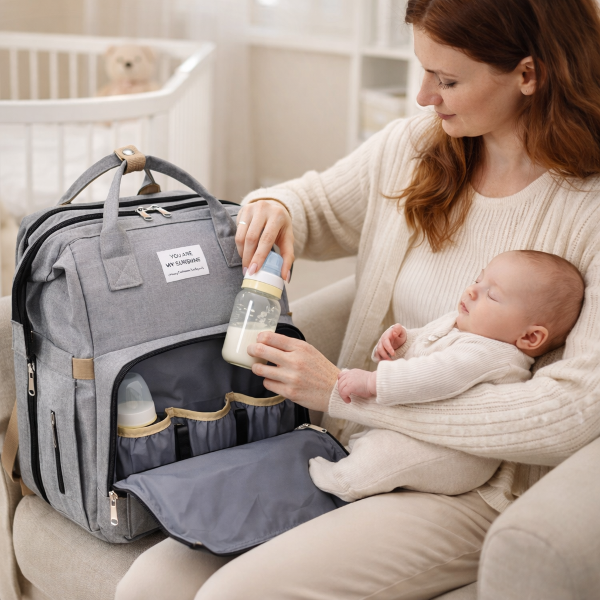 Mochila pañalera multifuncional con cuna portátil